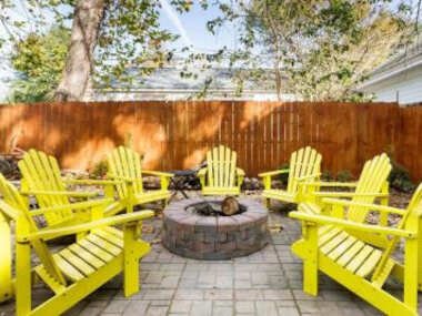 Vibrant, Colorful Condo Building with Backyard Firepit and Games