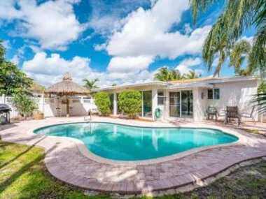 Larrys Lauderdale Getaway with Heated Pool and Tiki Hut