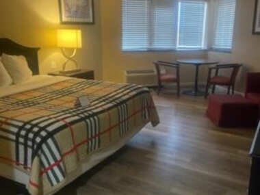 Apm Inn & Suites