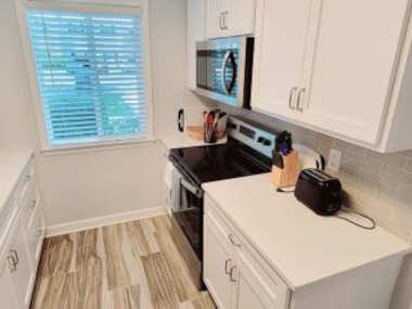N1 UPGRADED comfortable and well maintained bedrooms upstairs large living room screened porch