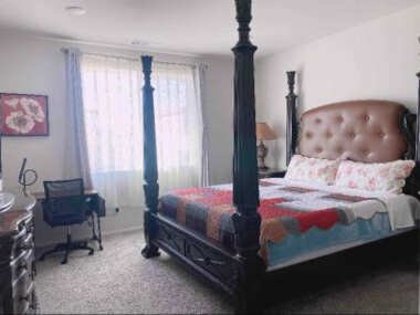 Large master bedroom with Separate bathroom and work desk on the first floor