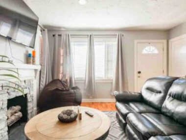 Charming Farmhouse Retreat near Downtown & University Modern Amenities, Fireplace & Porch!